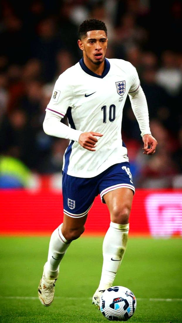 A soccer player in an England national team uniform with the number 10 dribbles a ball on the field during a match, streamed live via Bulgaria IPTV.